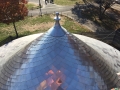 turret made of custom terne shingles with an ornamental finial