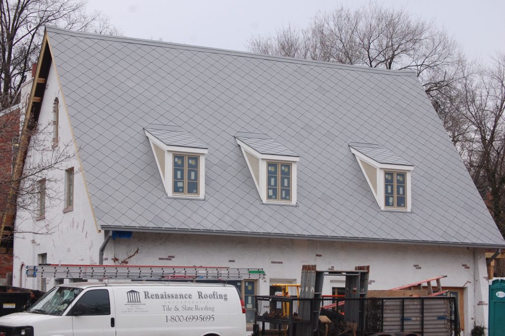 zinc-shingle-saddle-roof-with-dormers