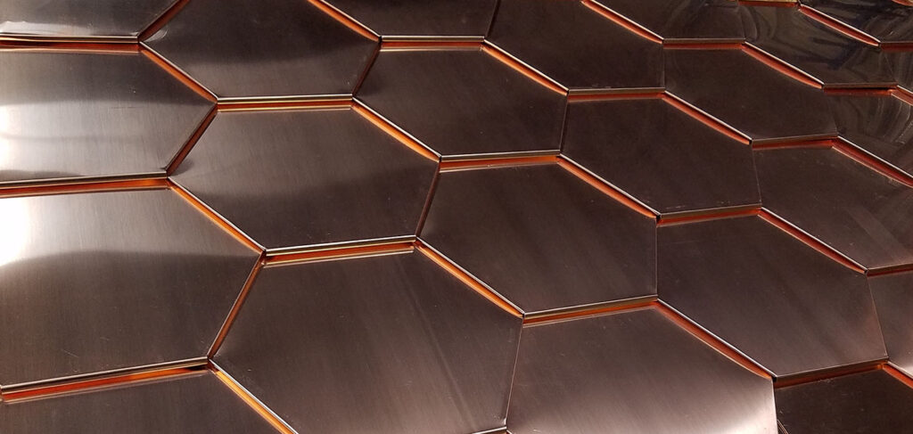 close up image of copper hexagon shingles