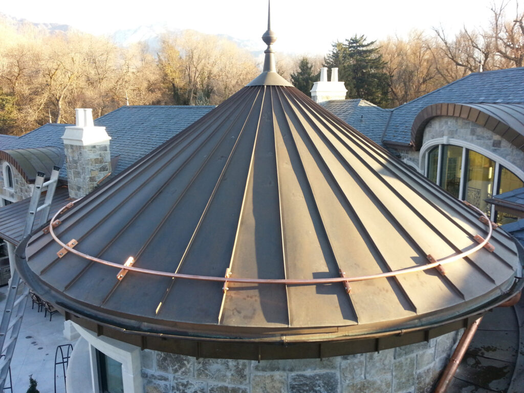 Copper Turret with snow guards and radius gutter