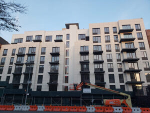 1825 Ocean Ave New York white diamond metal shingle on apartment complex building