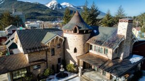 Castle home with copper diamond metal roofing shingles