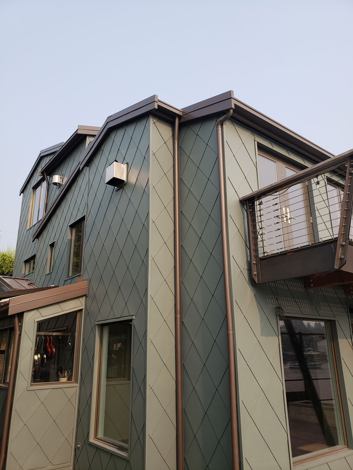 home with green metal siding