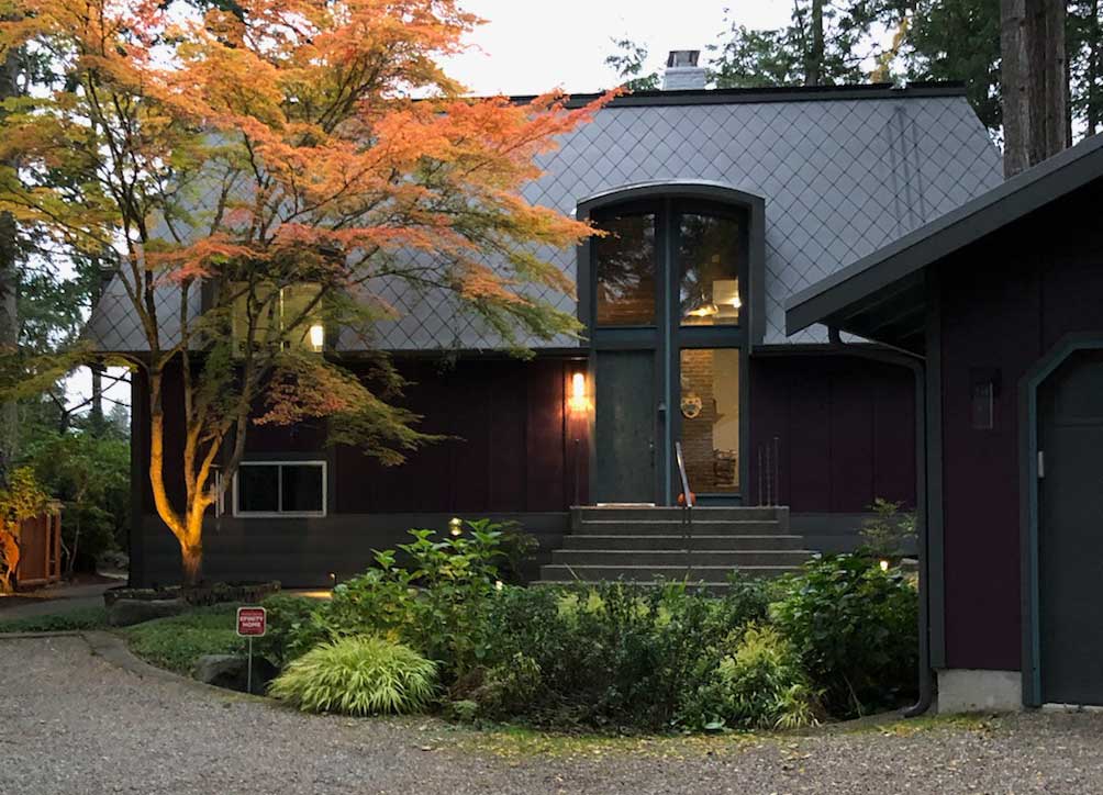 Home with Zinc metal shingle roof