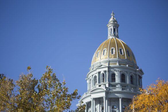 historic building with gold dome metal roof in denver