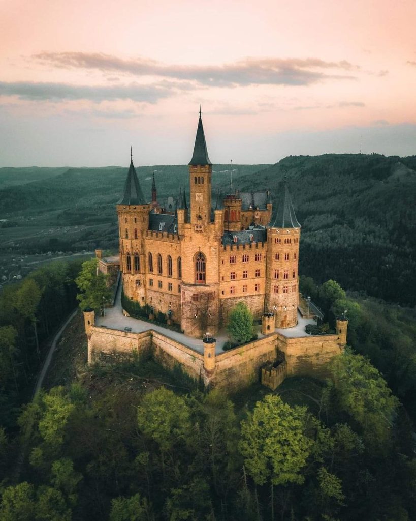 Burg Hohenzollern Bei Bisingen Castle on top of a wooded hill