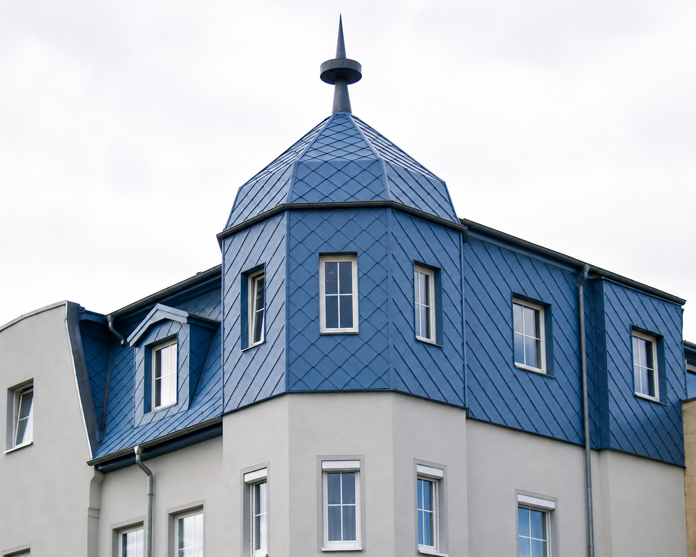 Blue Florida NOA diamond shingle roof showing PVDF color retention