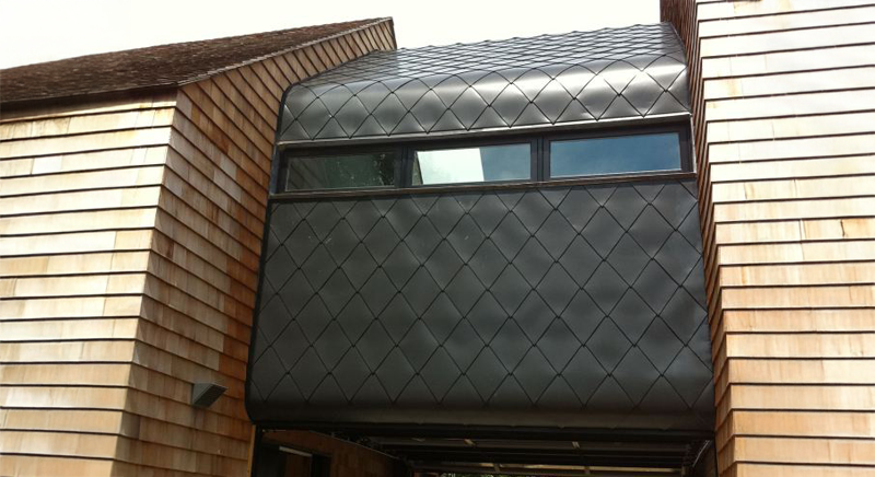 Spengler Industries metal diamond shingle roof on a home in the Hamptons